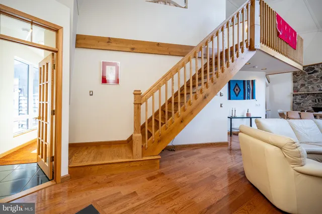 a living room with furniture and a table