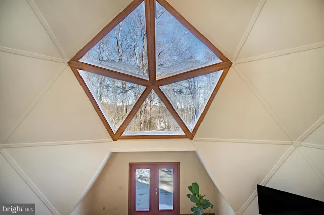 a view of house with a window and the door