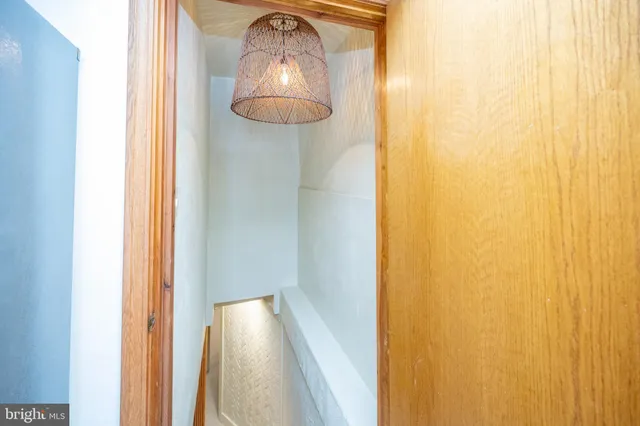 a view of balcony with wooden floor and fence