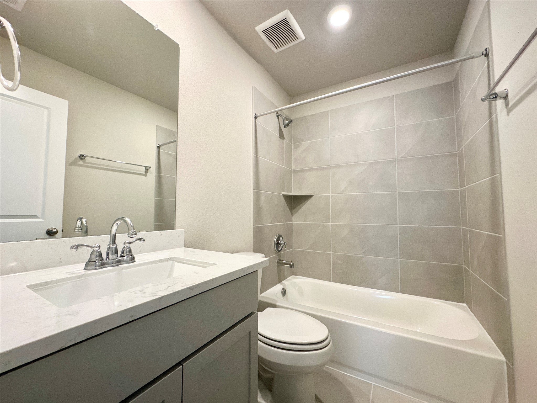12176 Ridge Top Drive Conroe, TX 77304 - Photo 12 of 27 a bathroom with a sink a toilet and shower