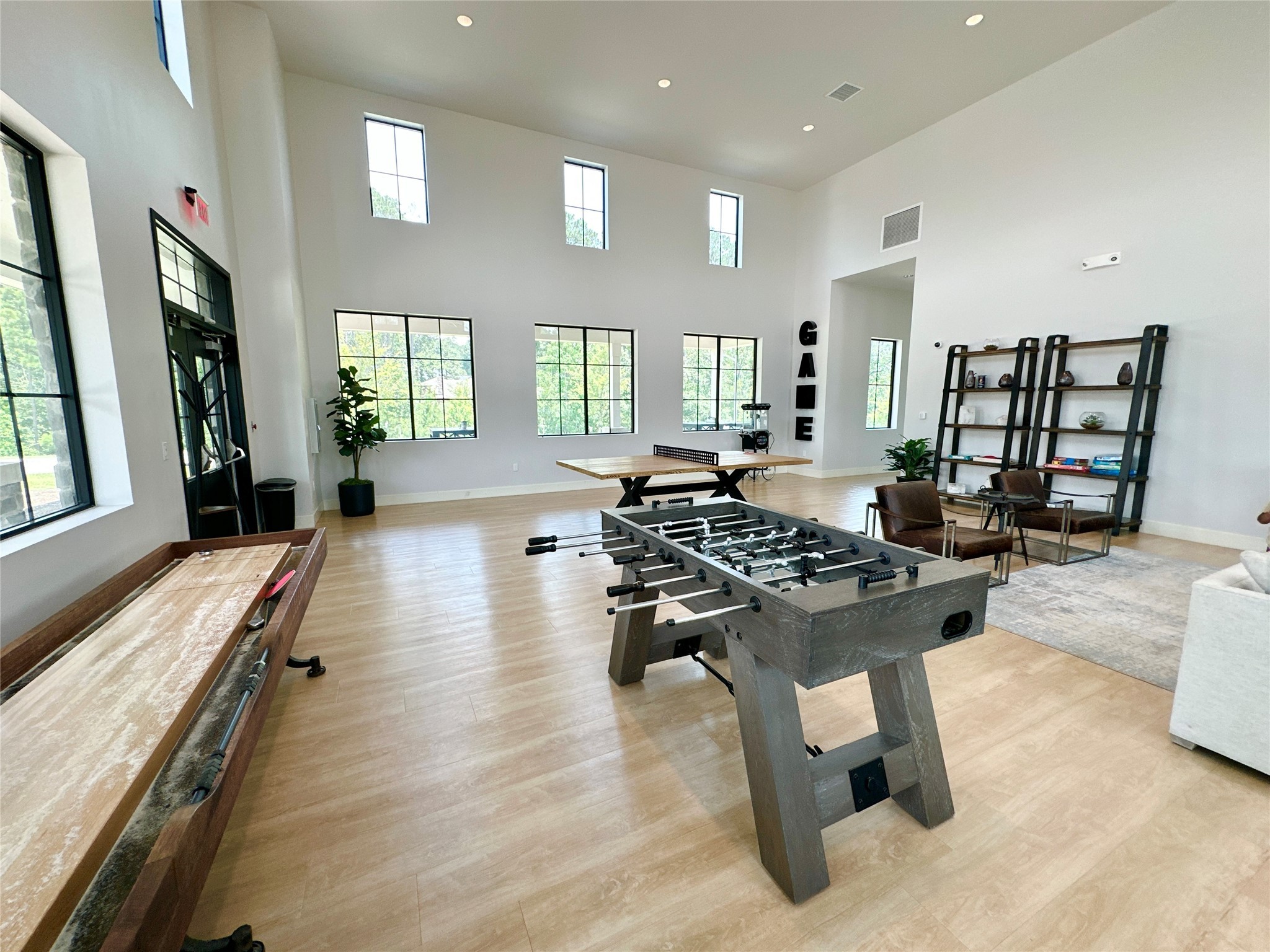 12176 Ridge Top Drive Conroe, TX 77304 - Photo 26 of 27 a living room with furniture stove and a large window