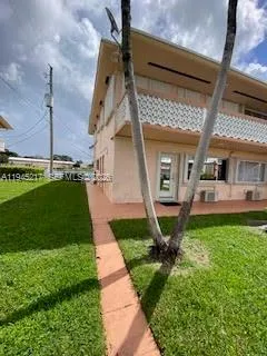a view of a balcony with a swimming pool