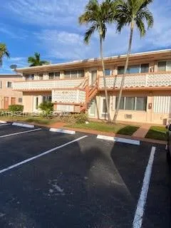 a view of a street with seating space