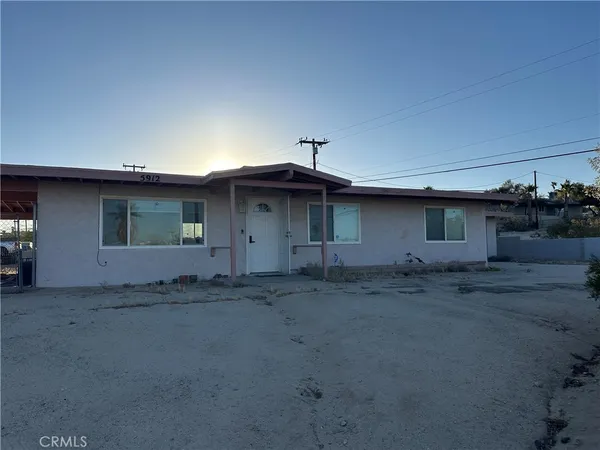 a front view of a house with a space
