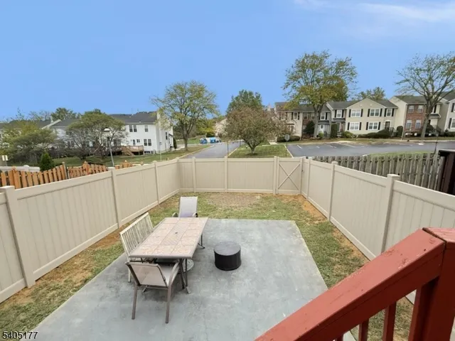 a view of a terrace with chairs