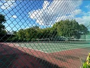 a view of a backyard with sitting area