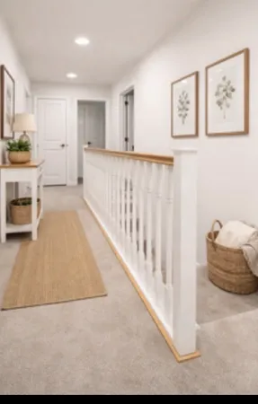 a hallway with a large mirror