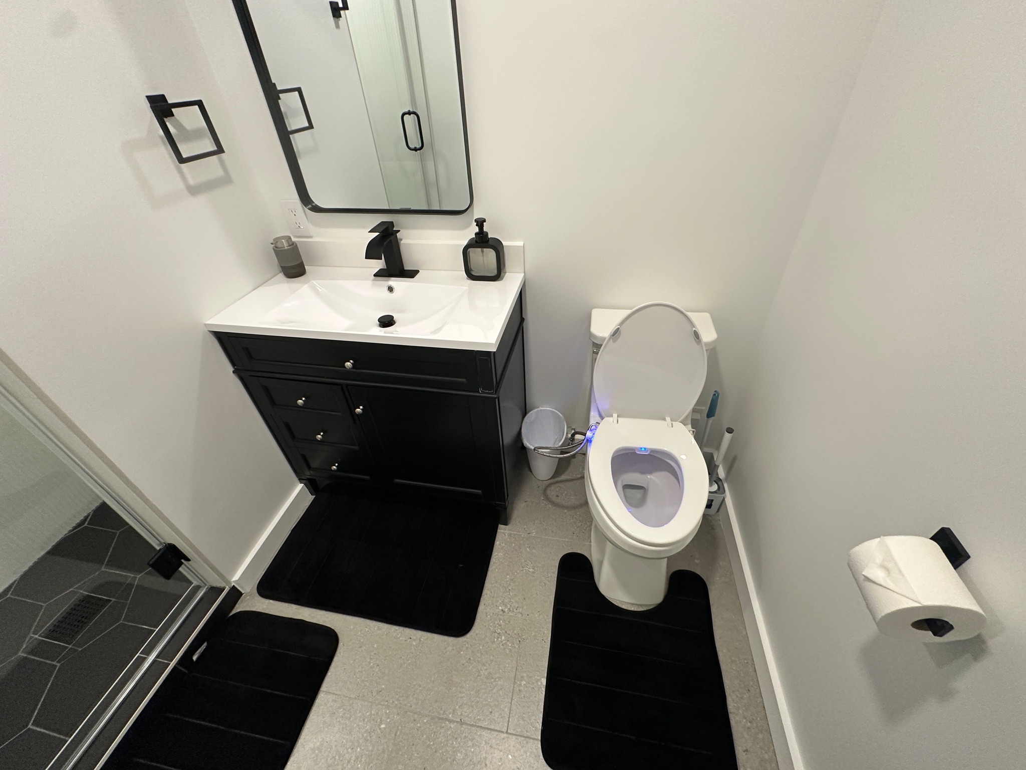 3210 Hampton Road, Unit A B C Austin, TX 78705 - Photo 8 of 42 Full bath with vanity, a stall shower, and speckled floor
