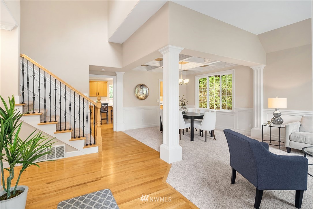 3002 204th Street Southeast Bothell, WA 98021 - Photo 3 of 27 a living room with furniture and a wooden floor