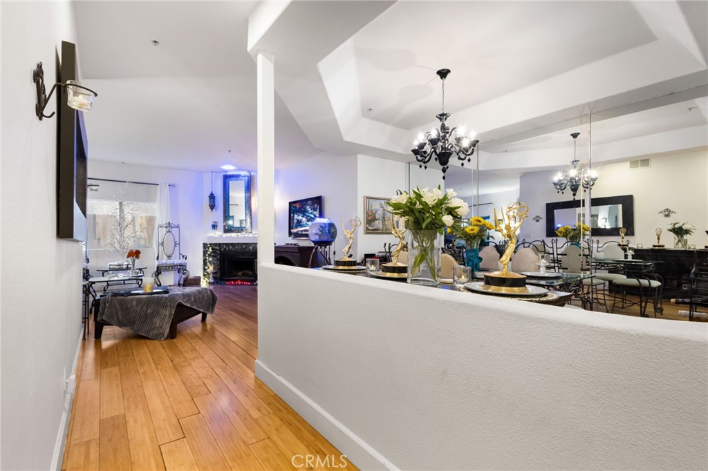 a view of a living room and kitchen