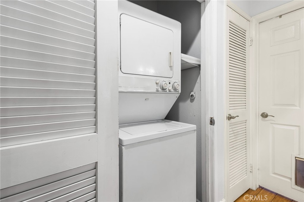 10626 Valley Spring Lane, Unit 103 Toluca Lake, CA 91602 - Photo 32 of 44 a utility room with dryer and washer