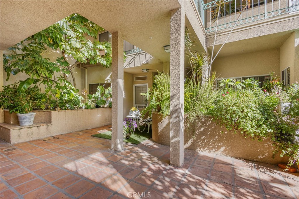 10626 Valley Spring Lane, Unit 103 Toluca Lake, CA 91602 - Photo 43 of 44 a view of a potted plants in front of a house