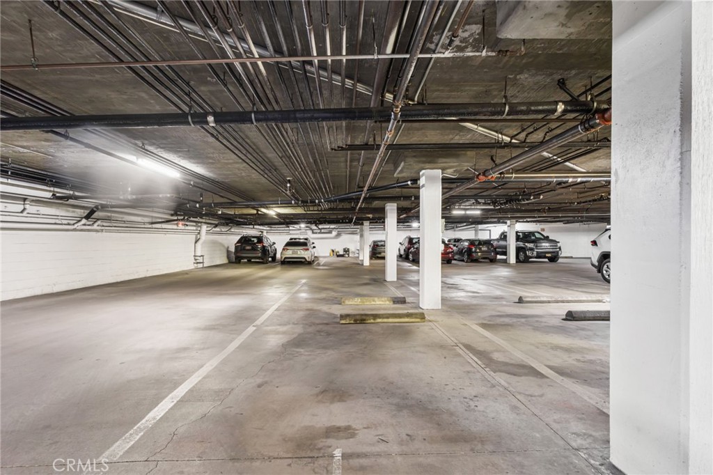 10626 Valley Spring Lane, Unit 103 Toluca Lake, CA 91602 - Photo 58 of 67 a view of parking garage with kitchen