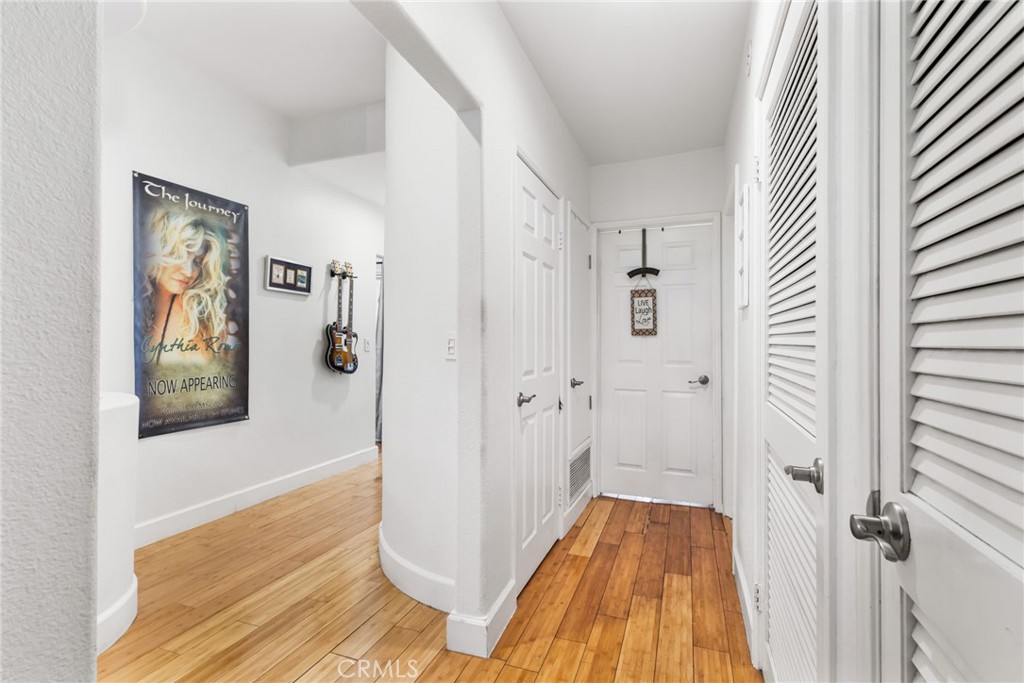 10626 Valley Spring Lane, Unit 103 Toluca Lake, CA 91602 - Photo 7 of 67 a view of a bathroom with wooden floor and a bathroom