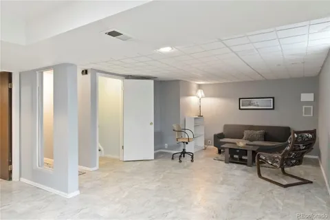 a living room with furniture and a couch