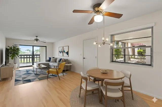 a bedroom with a bed and a lamp on table