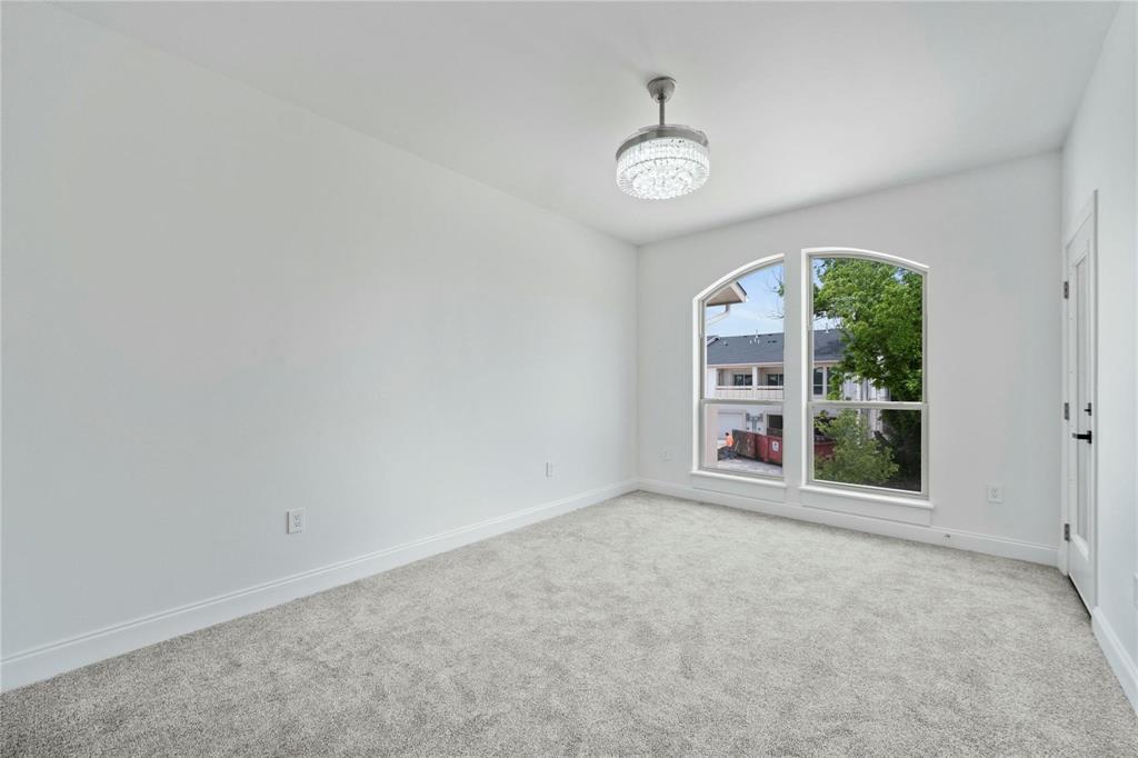 6238 Dewitt Street Sachse, TX 75048 - Photo 17 of 21 an empty room with windows