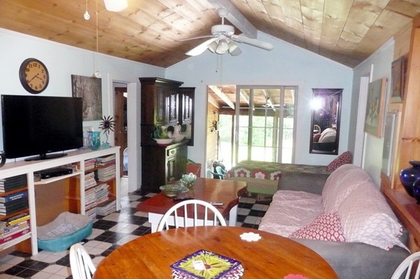117 Folly Mill Road Salisbury, MA 01952 - Photo 7 of 18 a living room with furniture a flat screen tv and a large window