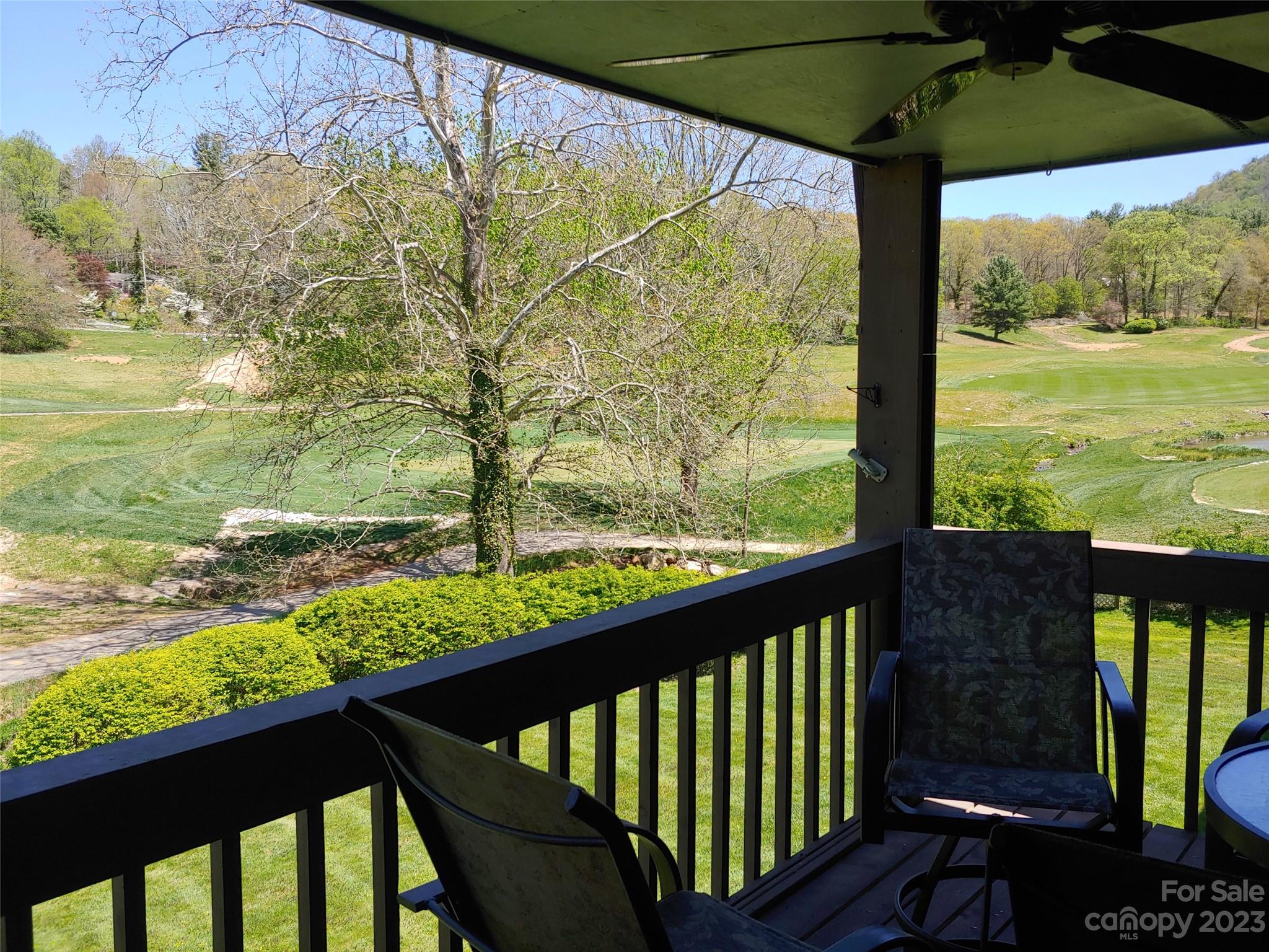 87 Willow Road, Unit D14 Waynesville, NC 28786 - Photo 17 of 47 a view of a balcony with an ocean view