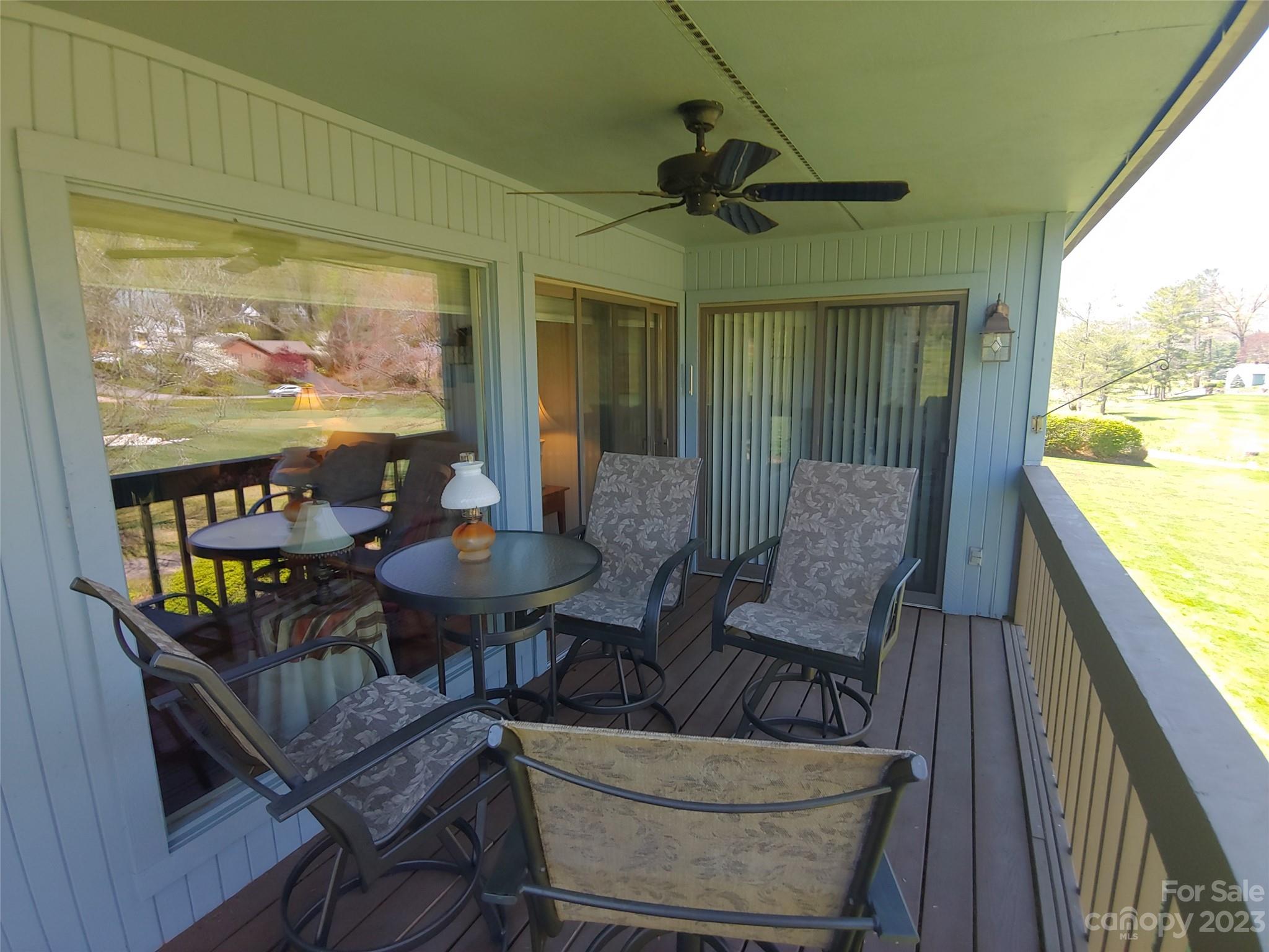 87 Willow Road, Unit D14 Waynesville, NC 28786 - Photo 18 of 47 a view of a dining room with furniture window and outside view