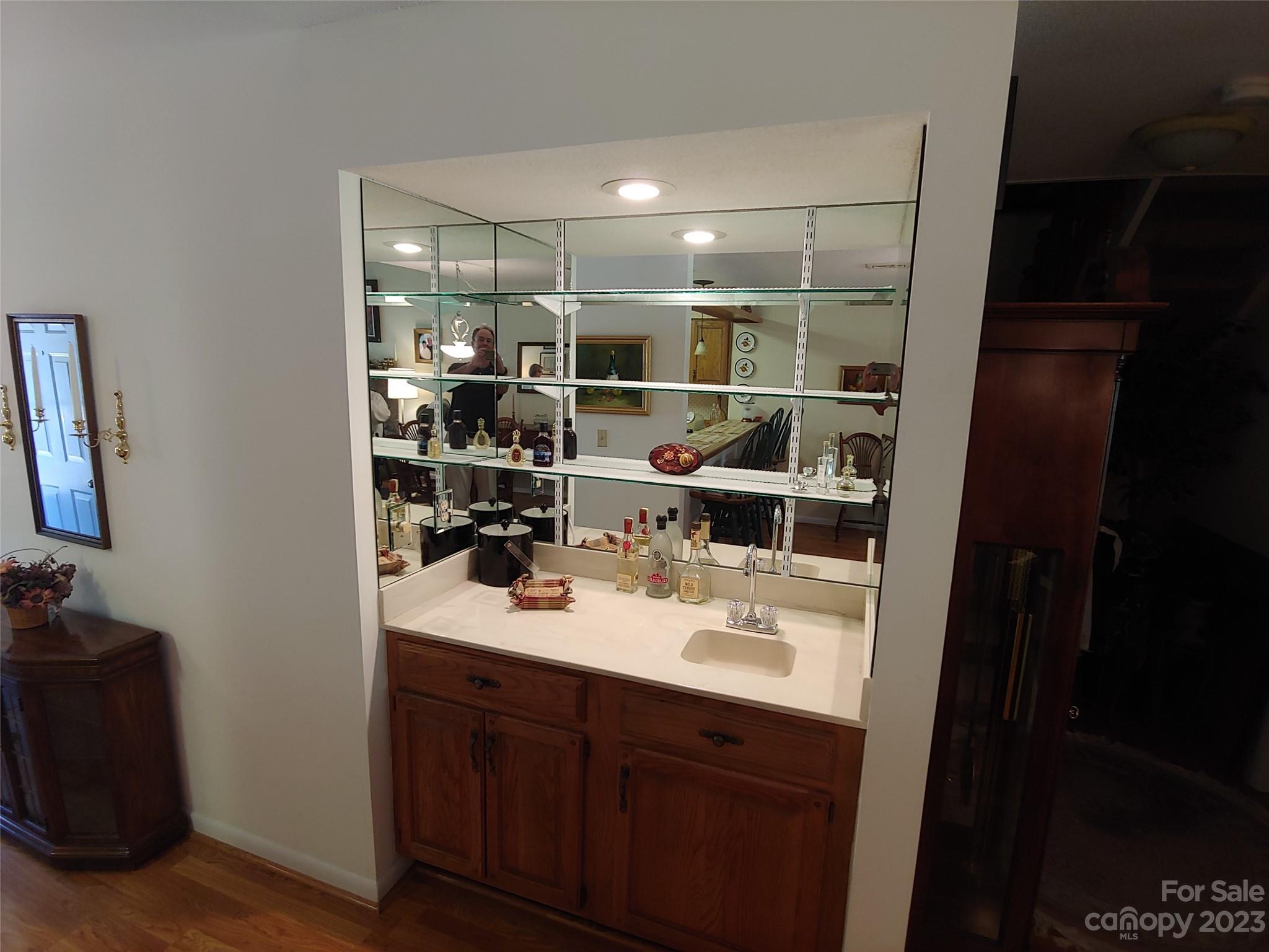 87 Willow Road, Unit D14 Waynesville, NC 28786 - Photo 30 of 47 a bathroom with a sink vanity and mirror