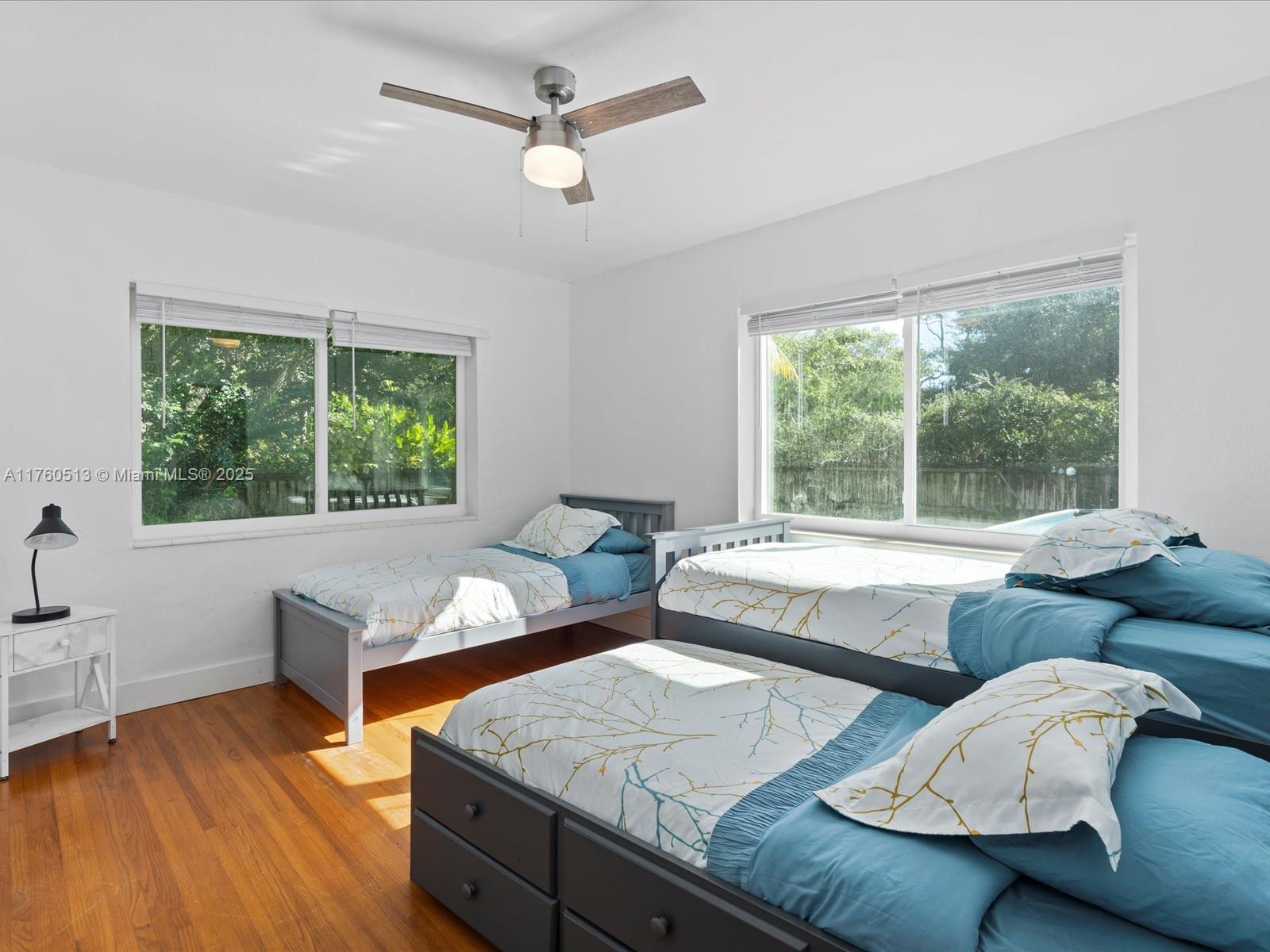 3981 Southwest 58th Street Dania Beach, FL 33312 - Photo 19 of 37 a living room with furniture and a large window