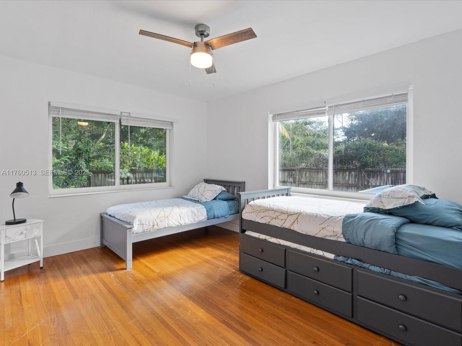 3981 Southwest 58th Street Dania Beach, FL 33312 - Photo 20 of 37 a living room with furniture and a large window