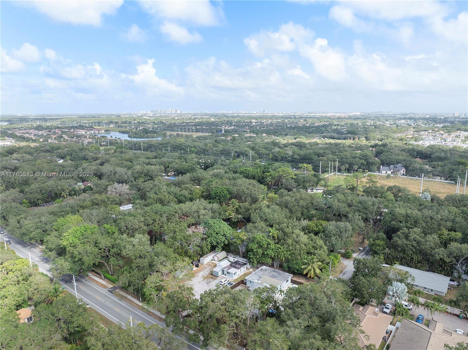 3981 Southwest 58th Street Dania Beach, FL 33312 - Photo 24 of 37 an aerial view of residential house with outdoor space and trees
