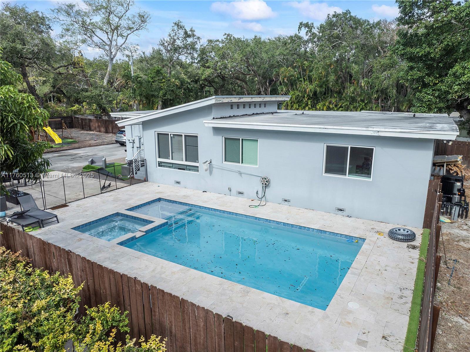 3981 Southwest 58th Street Dania Beach, FL 33312 - Photo 33 of 37 a view of a house with backyard