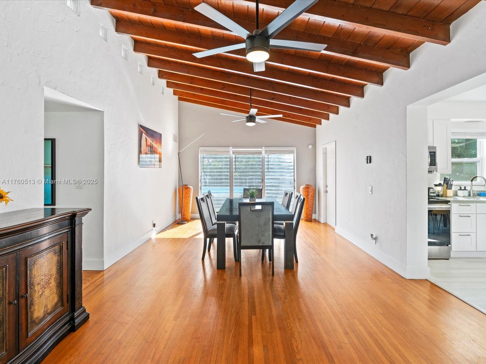 3981 Southwest 58th Street Dania Beach, FL 33312 - Photo 6 of 37 a dining room with furniture and wooden floor