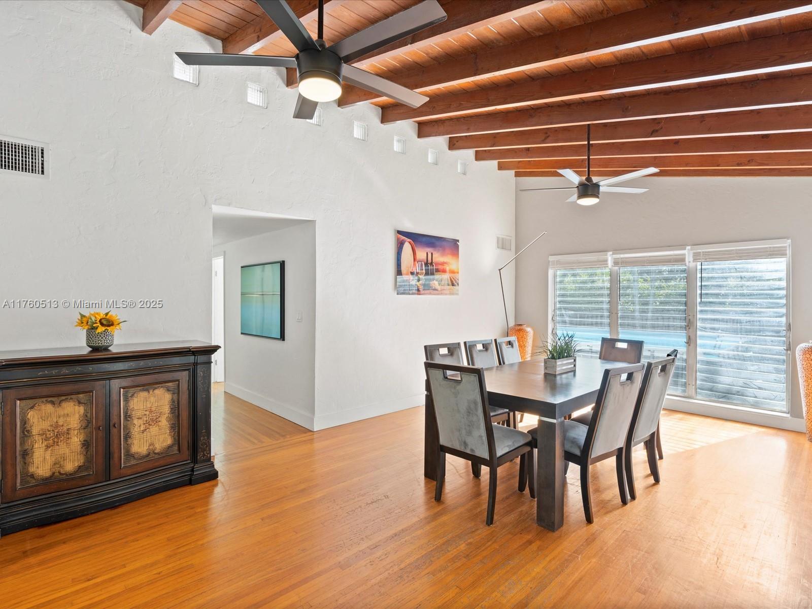 3981 Southwest 58th Street Dania Beach, FL 33312 - Photo 7 of 37 a view of a dining room with furniture window and wooden floor