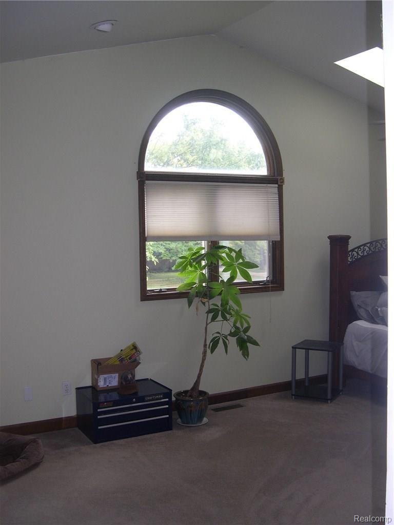 10219 Farmington Road Livonia, MI 48150 - Photo 26 of 34 BEAUTIFUL HALF MOON WINDOW IN MASTER