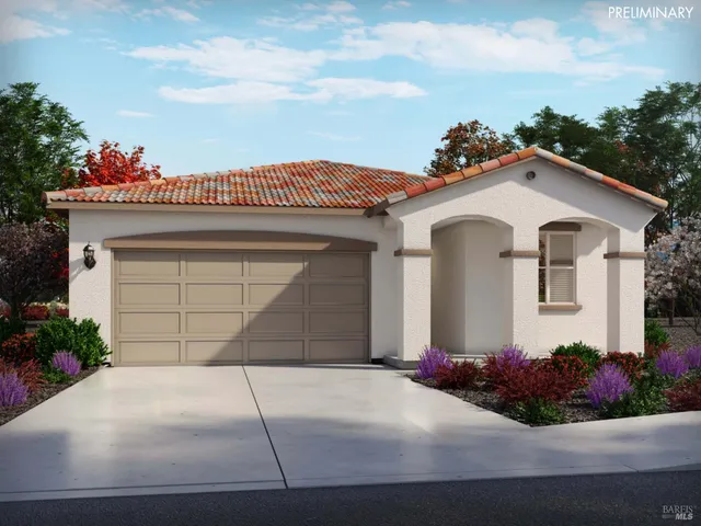 a front view of a house with a garage