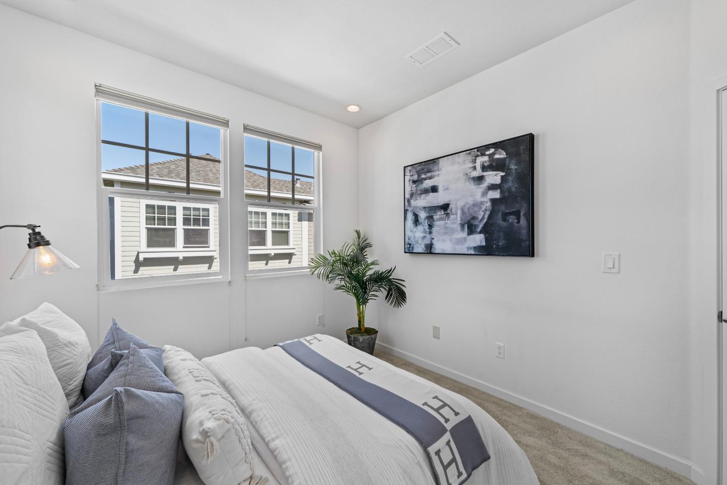 119 Orbit Way Mountain View, CA 94043 - Photo 22 of 46 a bedroom that has a bed and a window