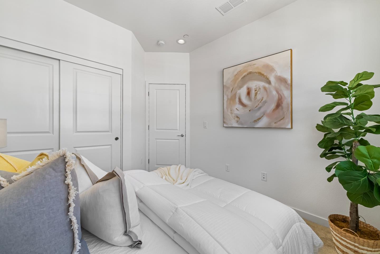 119 Orbit Way Mountain View, CA 94043 - Photo 26 of 46 a bedroom with a bed and a plant
