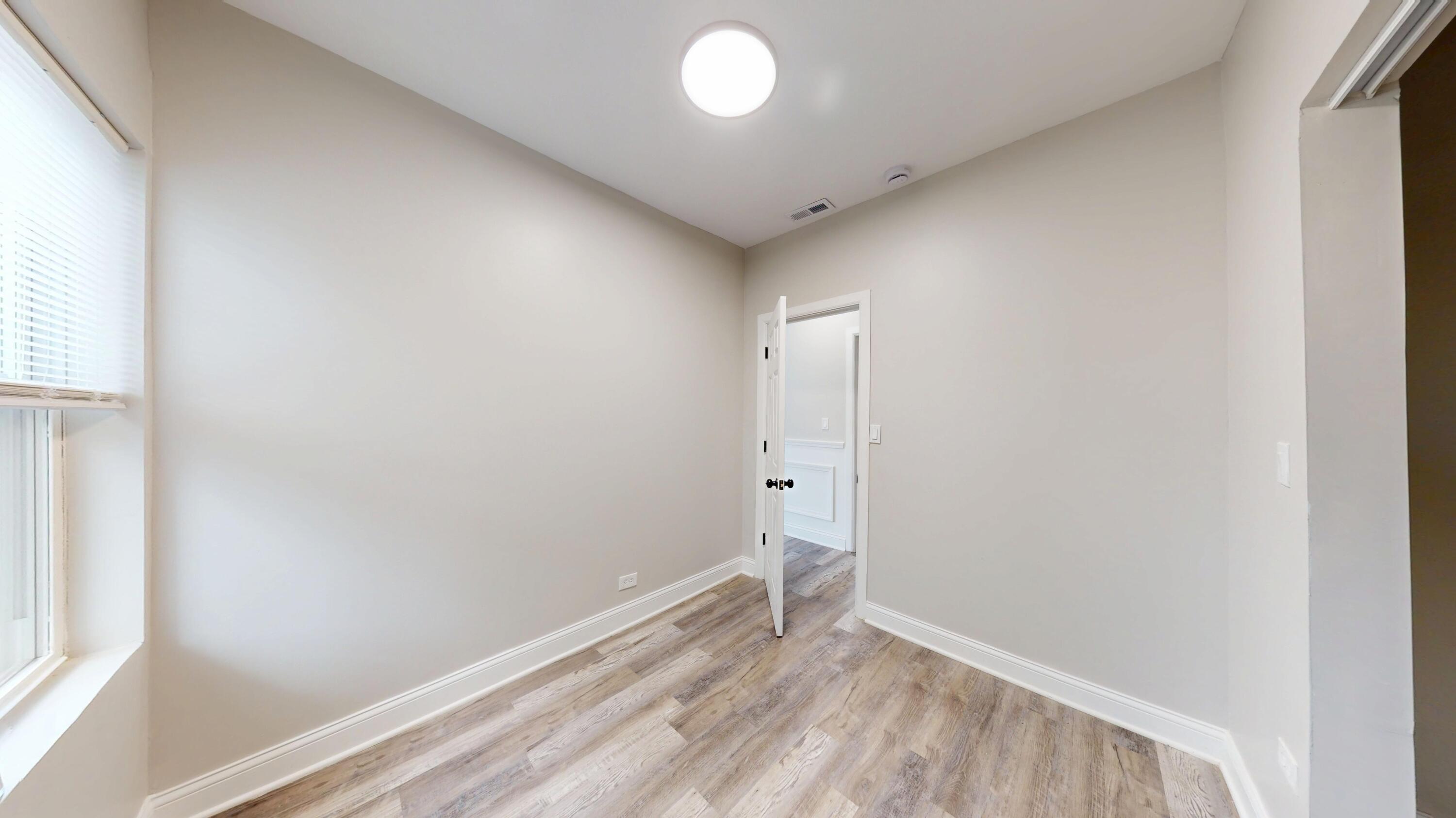 1379 Roosevelt Place Gary, IN 46404 - Photo 15 of 50 wooden floor in an empty room