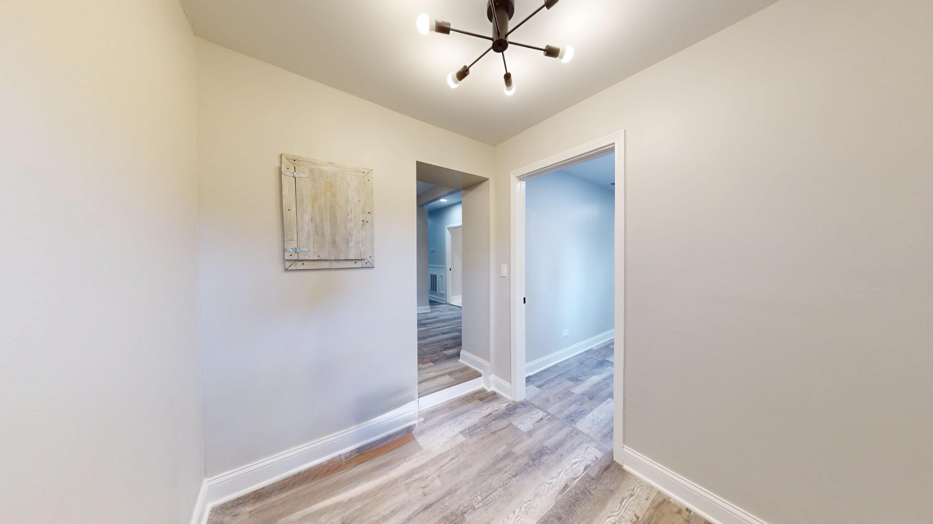 1379 Roosevelt Place Gary, IN 46404 - Photo 24 of 50 a view of empty room with wooden floor