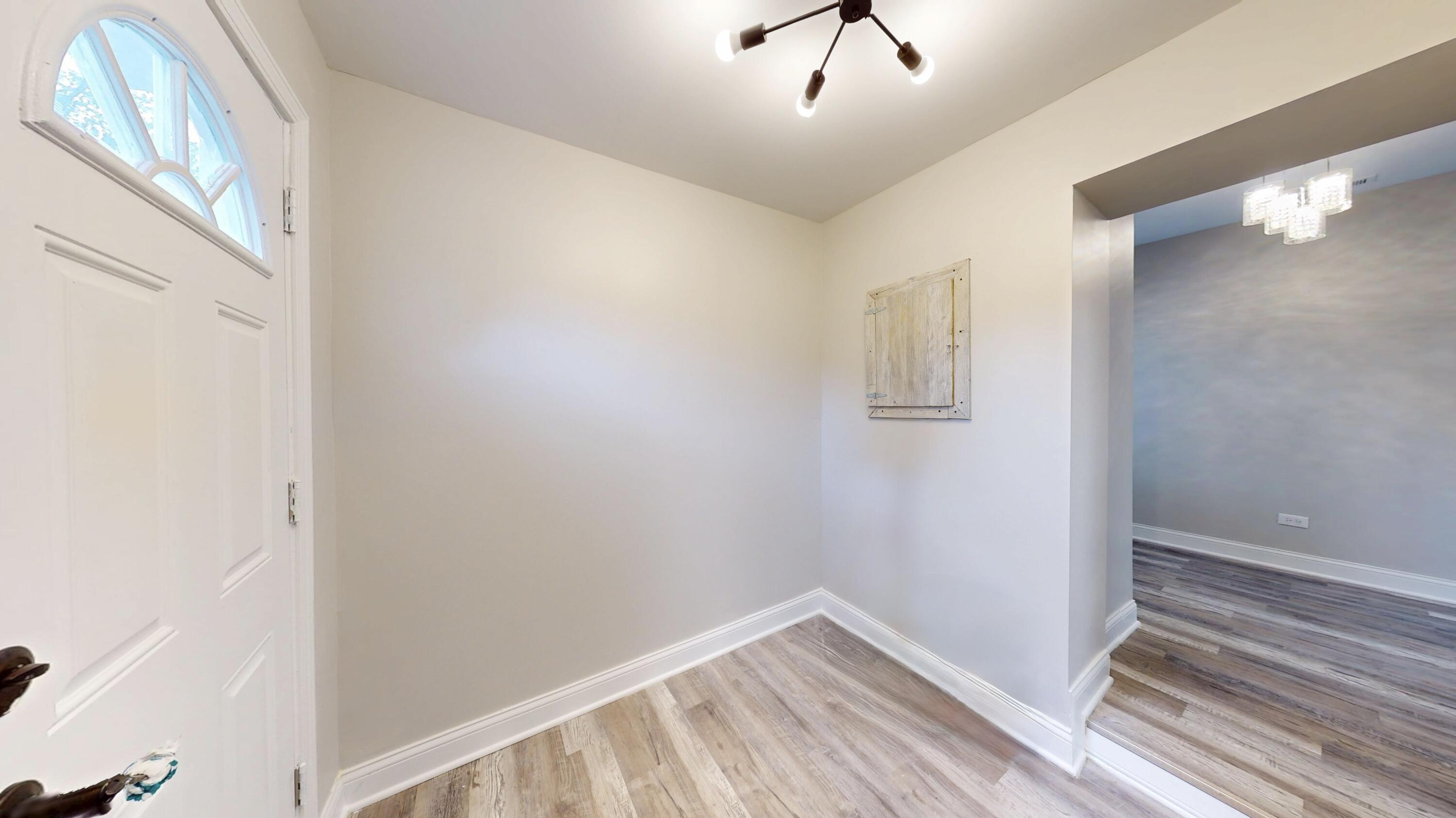 1379 Roosevelt Place Gary, IN 46404 - Photo 25 of 50 a view of room with window and hardwood floor