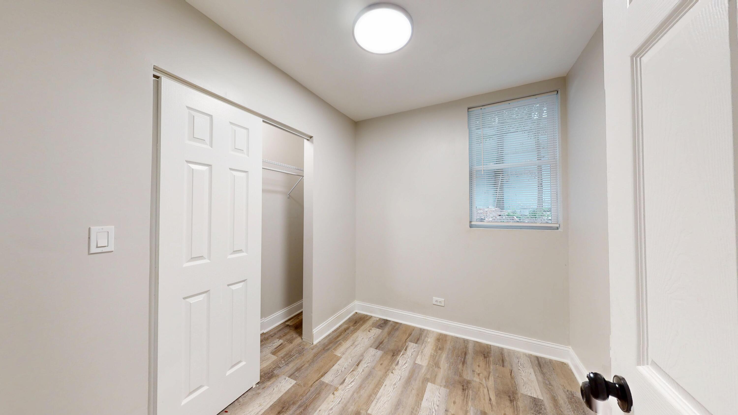 1379 Roosevelt Place Gary, IN 46404 - Photo 32 of 50 an empty room with windows