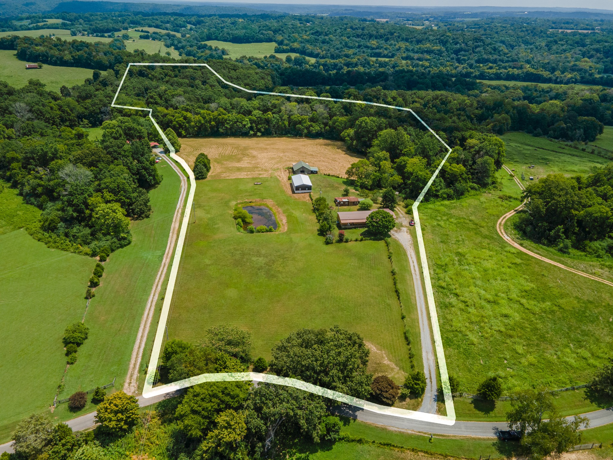 915 Maddox Road Centerville, TN 37033 - Photo 39 of 90 an aerial view of a residential houses with outdoor space and trees