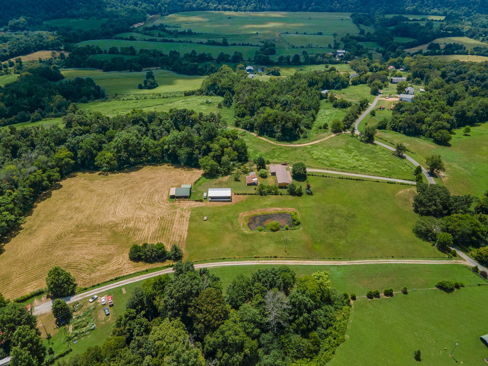 915 Maddox Road Centerville, TN 37033 - Photo 40 of 90 an aerial view of a residential houses with outdoor space and street view