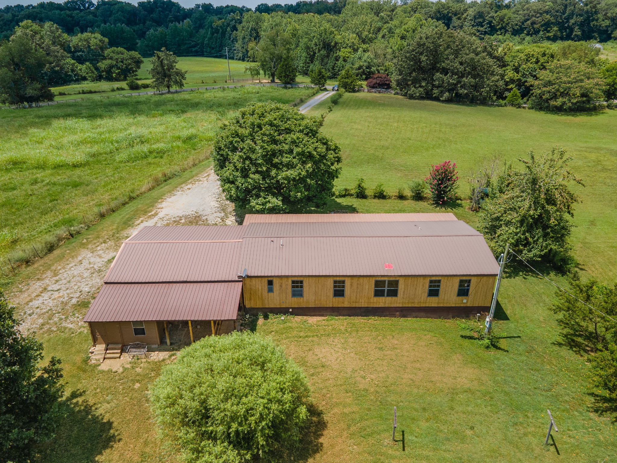 915 Maddox Road Centerville, TN 37033 - Photo 54 of 90 a view of a back yard of a house