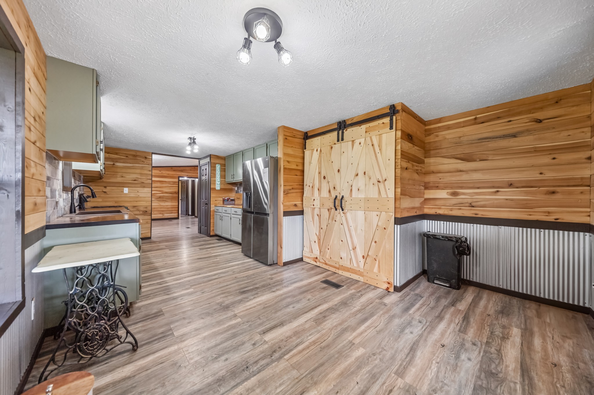 915 Maddox Road Centerville, TN 37033 - Photo 6 of 90 a view of a hallway with wooden floor and staircase