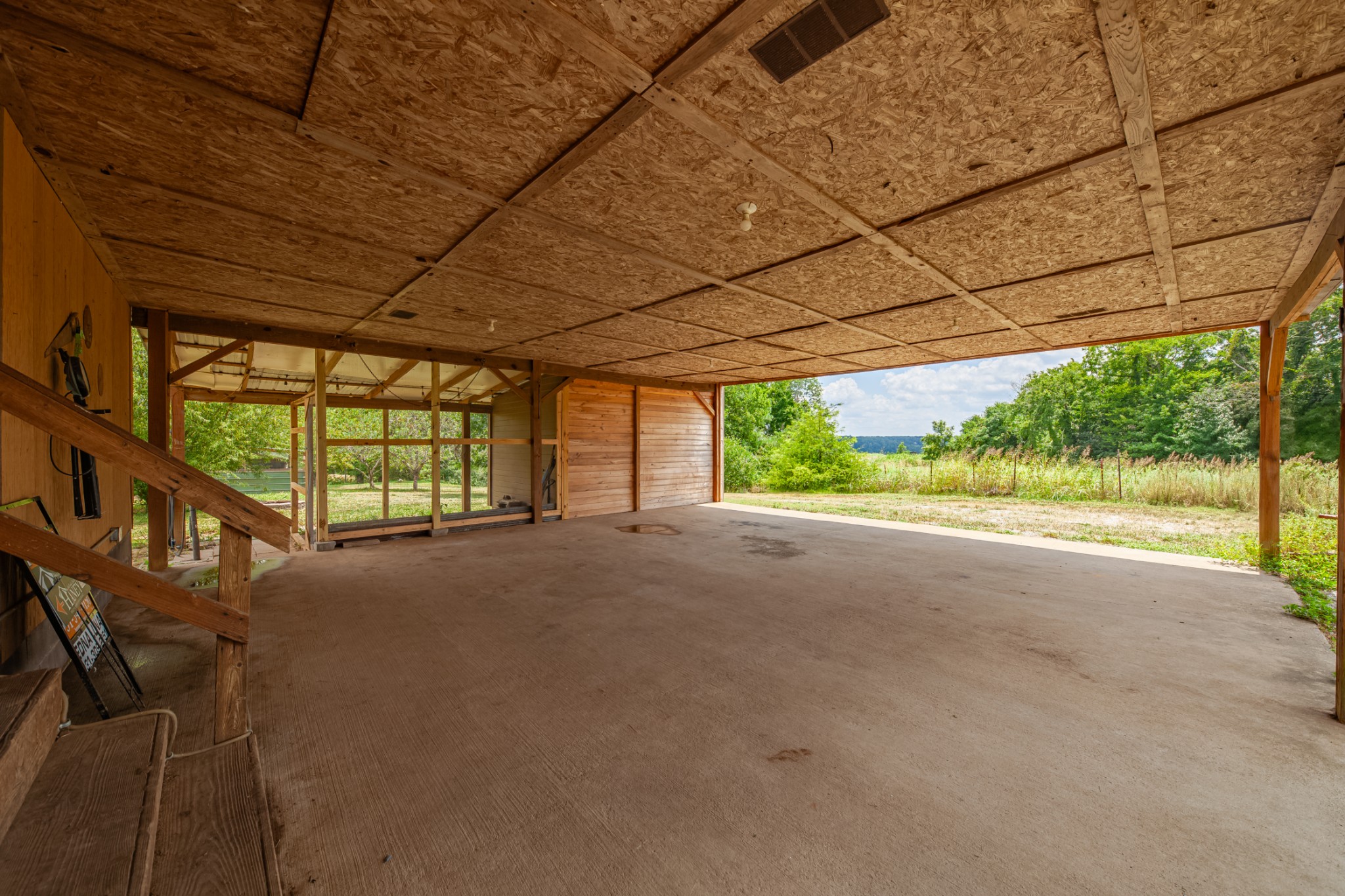915 Maddox Road Centerville, TN 37033 - Photo 73 of 90 a view of a room with wooden walls and roof