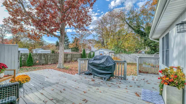 a wooden door with a sign on it