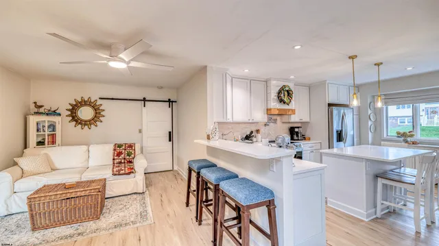 a view of kitchen with breakfast area