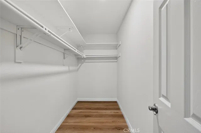 a view of a room with racks on the wall