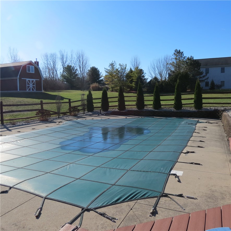 10160 Lochard Road Sidney, OH 45365 - Photo 39 of 41 Relax poolside in the serene private yard, featuring a pool and ample space for outdoor activities.