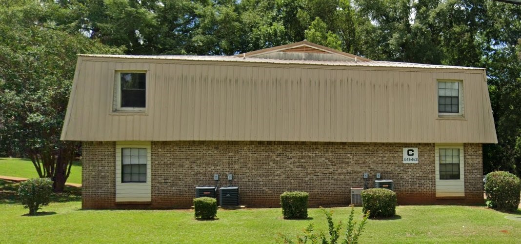 496 Perdue Place Greenville, AL 36037 - Photo 2 of 6 a front view of a house with a yard