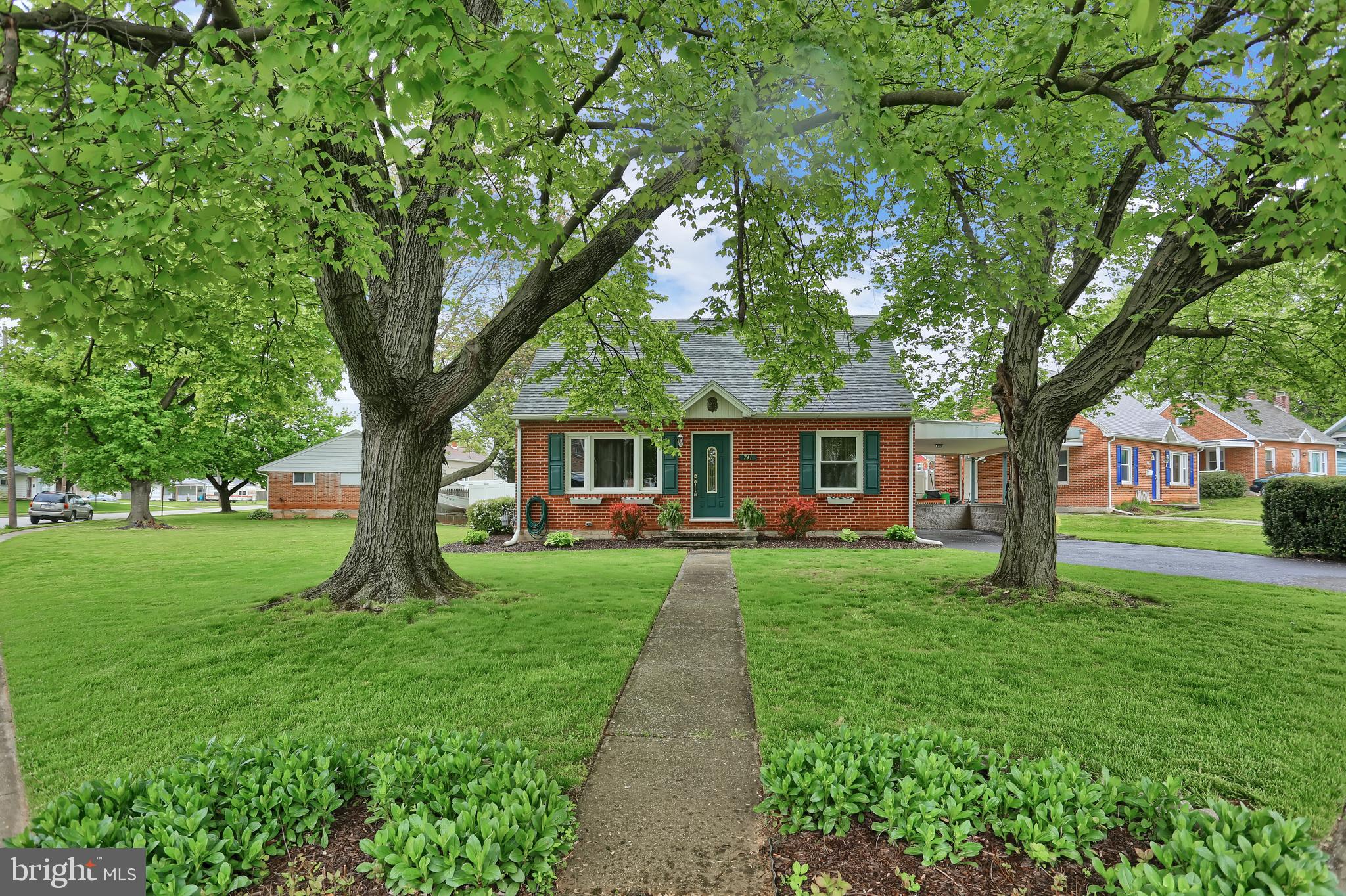 741 Gunnison Road York, PA 17404 - Photo 1 of 35 a front view of a house with garden